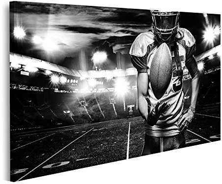 islandburner Bild auf Leinwand American Football Spieler Helm Mit Ball Im Stadion Schwarz Weiß Bilder Wandbilder Poster