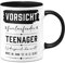 Tassenbrennerei Tasse - Vorsicht freilaufender Teenager - Kaffeetasse lustig mit Spruch als Geschenk zur Jugendweihe - Geschenkidee Sohn, Tochter (Schwarz)
