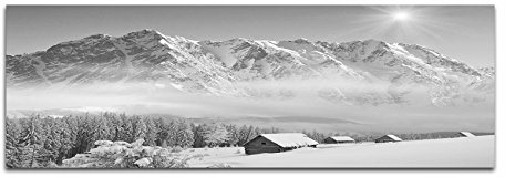 Leinwandfoto als Panorama SCHWARZ/WEISS 150x50cm Winterlandschaft Berge Wald Häuser Schnee
