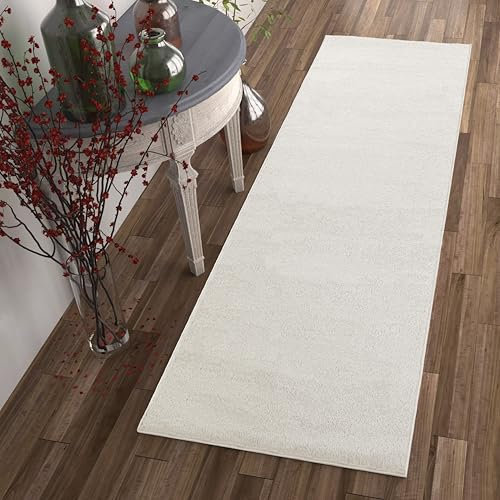 Fashion4Home Teppich Wohnzimmer – Einfarbig Teppich, Uni Teppich fürs Kinderzimmer, Schlafzimmer, Arbeitszimmer, Büro, Flur und Küche - Kurzflor Teppich Cream-Weiß, Größe: 80x250 cm