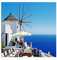 Augenblicke Wandbilder 80x80cm - Fotodruck auf Leinwand und Rahmen Santorini Windmühle Meerblick Restaurant - Leinwandbild auf Keilrahmen modern stilvoll - Bilder und Dekoration