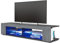 Vladon Buffet Bas Movie, Meuble TV avec 4 Compartiments Ouverts et placages décoratifs, Noir Mat/Avola-Anthracite, éclairage LED Bleu Inclus (134 x 29 x 39 cm)