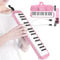 Irin Melodica Melodica, ein wunderschöner Klang und umweltfreundliches Material Kleines Mundstück Irin Melodica 32 Key Wind Musikinstrument Geeignet für Anfängerübungen + Tasche(Rosa) Blasinstrument