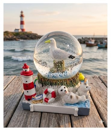 große Schüttelkugel Maritim mit Robbe und Leuchtturm 9 x 9 x 9 cm Maritim See Meer Schneekugel Deko GCG 5350