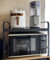 Uwenkjie Expandable microwave oven rack, oven rack, kitchen shelf rack with 6 hooks, baking rack, kitchen counter storage rack to save space, carbon steel load-bearing 55 pounds/25 kilograms