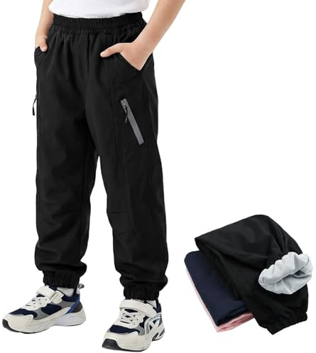Domueay Kinder Wanderhose Jungen Wasserdicht Winddicht Atmungsaktiv Softshellhose mit Mesh Futter Elastischem Bund Weiche Regenhose Trekkinghose Outdoorhose Matschhose, GR.128-134, Schwarz