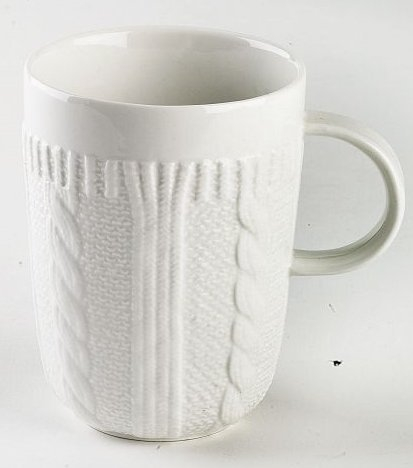 Becher/Mug aus Porzellan, weiß, in schicker Strickoptik, aus der Kollektion Pullover von TOGNANA. 350 ml. Volumen