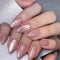 Flash Cat Eye Press-On Nails in Almond Shape - 24Pcs Pink Glitter False Nails with Gradient Glossy Finish and Strong Hold, Full Cover Design.