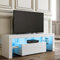 SIRHONA Mueble de TV bajo blanco, banco de TV de salón con luz LED, 130 x 35 x 45 cm, armario de base