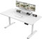TRIUMPHKEY 160x70cm Electric Standing Desk Height Adjustable Desk With Monitor Hooks Stand Storage Shelf Home Office Sit Stand Study Table With Memory Smart Panel(White)