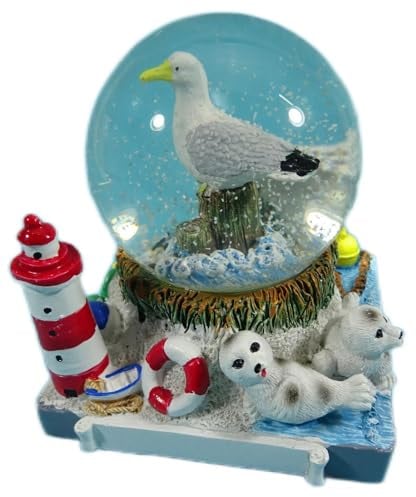große Schüttelkugel Maritim mit Robbe und Leuchtturm 9 x 9 x 9 cm Maritim Schneekugel Deko GCG 5350