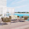 KUAKE Outdoor Rattan Lounge, 4-teiliges Gartenmöbel Sofa Set, mit Tischplatte aus Glas, Gartenlounge, inkl Sitz- und Rückenkissen (Beige)