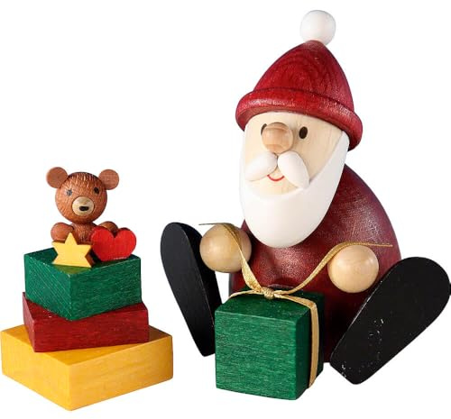 Erzgebirge Palast Ullrich Kunsthandwerk Weihnachtsmann mit Geschenk und Geschenkestapel - 8,3 cm
