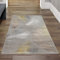 Teppich-Traum Bettumrandung Designer Teppich Flur Wohn- & Schlafzimmer • hell-dunkel Effekt Palmenzweige grau Gold glänzend, Größe 60x110 cm