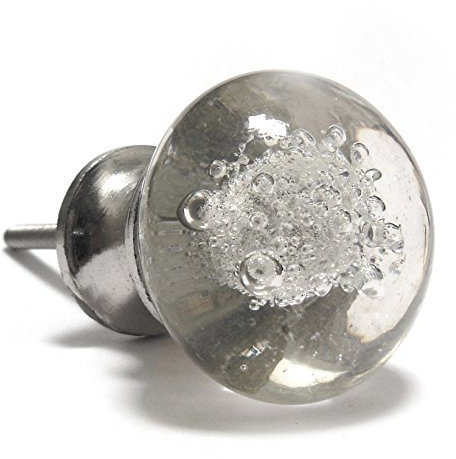 Pushka Home Clear Bubble Glass Chest of Drawers Cupboard Door Knob Handle. Sold individually. Features a distinctive bubbling effect. 35mm decorative handle suits furniture doors such as cupboards, cabinets, dressers, wardrobes etc. Knob is supplied with a fixed in standard screw, two nuts and one washer. Screw suits door thickness up to 28mm. Unique door pull made of clear glass with chrome silver base and suits many interior décor styles.