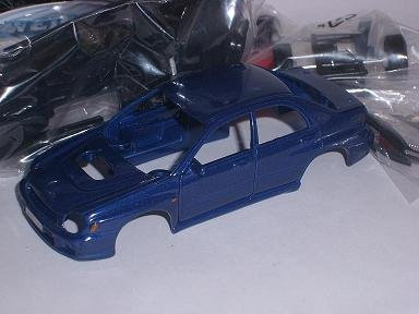 Welly Subaru Impreza WRX Sti Blau Limousine Bausatz Kit 1/43 Modellauto Modell Auto