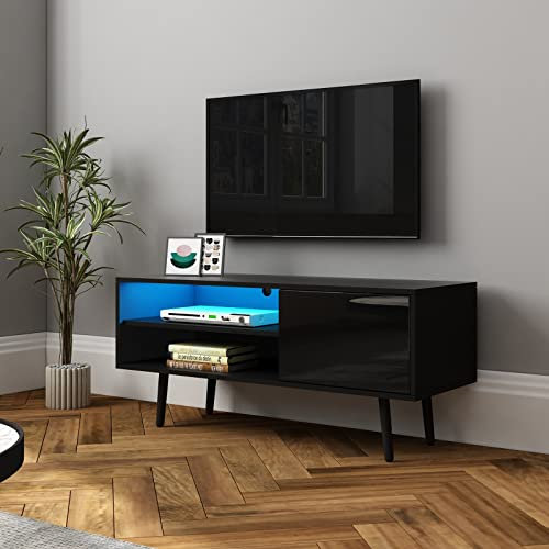 Komtopod TV Stand with 1 Door 2 Shelves, TV Unit with Wooden Legs, 110cm TV Stand Cabinet with LED Lights, for 40 Inch TVs, Living Room, Dining Room, Bedroom, Black