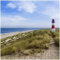 Wallario Glasbild Am Strand von Sylt Leuchtturm auf der Düne Panorama - 30 x 30 cm Wandbilder Glas in Premium-Qualität: Brillante Farben, freischwebende Optik