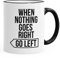 MoonWorks Spruch-Tasse When Nothing goes Right go Left Motivations-Tasse Kaffee-Tasse Teetasse schwarz Unisize
