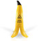 Betriebsausstattung24 Warnbanane „ACHTUNG! Rutschgefahr“ - Warnaufsteller in Bananenoptik - 4-seitig bedruckt - Stapelbar - Signalgelb - Größe 60 cm, Gelb