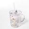 Intirilife Verre à boire pour enfants transparent avec couvercle, échelle et paille avec design licorne - 400 ml - Verre à boire avec poignée, avec motif mignon, boisson sans renversement sécurisée