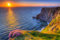 adrium Leinwand-Bild 80 x 50 cm: Cliffs of Moher bei Sonnenuntergang in Co. Clare, Irland (64891425)