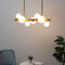 Kosilum – Hängeleuchte mit Kugeln, aus Glas, weiß, Oromia, warmweißes Licht, Beleuchtung für Wohnzimmer, Schlafzimmer, Küche, Flur, 7 x max. 5 W, 300 lm x 7 – G9 – IP20