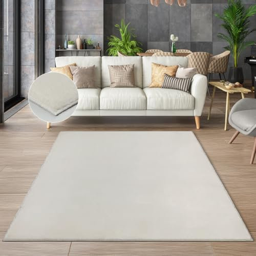the carpet Cosy kuschelig Warmer Fellteppich, weich und elegant, waschbar und Fußbodenheizung geeignet, Öko-Tex Zertifiziert, Creme, 70 x 140 cm
