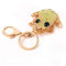 lachineuse - Porte-Clés Crapaud Feng Shui avec Pierres en Strass - Porte-Bonheur - Symbole de Prospérité & Fortune - 5,5 x 5,5 cm - Idée Cadeau Bijou Asiatique Japon - Coloris Doré & Vert