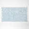 Homescapes Blaue Badematte Zickzack 50x80 cm, Badteppich getuftet, Chevron Badvorleger mit Bommeln