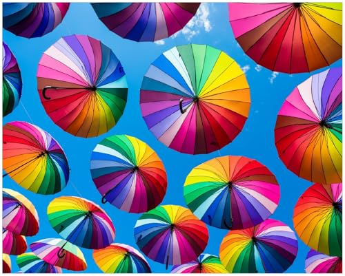 Wallario Poster - Bunte Regenschirme vor blauem Himmel in Premiumqualität, Größe: 40 x 50 cm