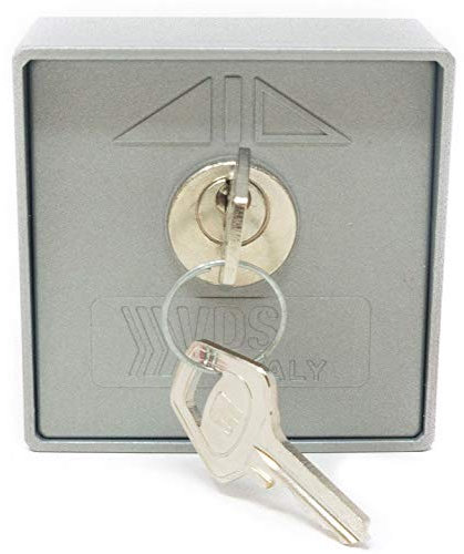 Selector de llave 2 posiciones para puertas automáticas en aluminio y color metal de la marca VDS para accionamiento manual de motores de puertas de garaje y otros automatismos.