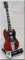 ANGUS YOUNG Miniatur Gitarre AC/DC mit Plektrum