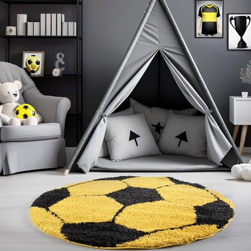 Carpetsale24 Kinderteppich Rund 100 cm Schwarz Gelb – Weicher Hochflor Spielteppich mit Fußball Motiv – Pflegeleicht & rutschfest – Ideal für Jungenzimmer & Mädchenzimmer im Jugendstil