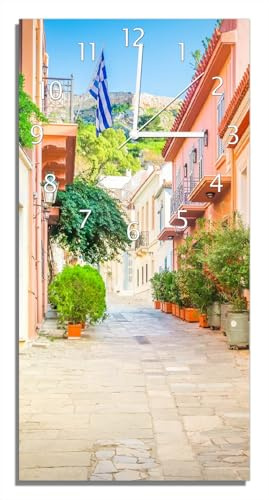 Wallario Design-Wanduhr, Acrylglasuhr Größe 30 x 60 cm, weiße Zeiger, Motiv Mediterrane Straße im Blütenrausch