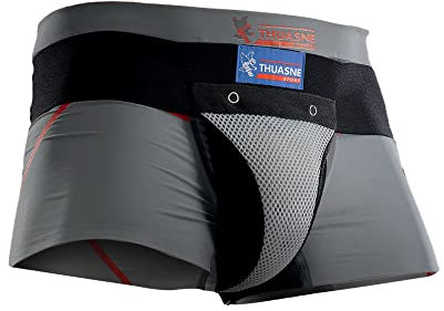 Thuasne - Coquille de Protection pour Homme - Coque Rigide pour Arts Martiaux, Boxe, Karaté, Taekwondo - Handball, Rugby - Large Elastique de Maintien - Taille XS