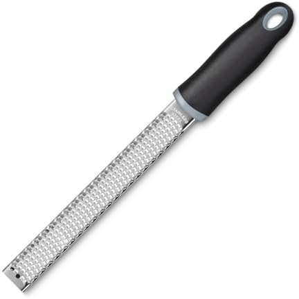 Deglon Zester Grater | Grinds garnishes directly over cocktails to enhance aroma and flavor presentation at professional bar setups.