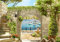 wandmotiv24 Fototapete Tor-bogen Mauer Meer, XXL 400 x 280 cm - 8 Teile, Fototapeten, Wandbild, Motivtapeten, Vlies-Tapeten, Schiff, Blumen, Pier, Meerblick M1228