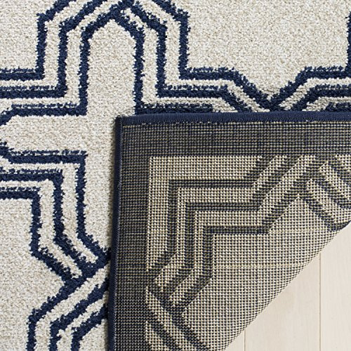 SAFAVIEH Amherst Collection Accent Rug - 2'6 x 4', Ivory & Navy, Geometric Design, Non-Shedding & Easy Care, Ideal for High Traffic Areas in Entryway, Living Room, Bedroom (AMT413M)