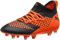 PUMA Unisex Kids Future 2.3 Netfit MG Jr Fußballschuhe, Black-Shocking Orange