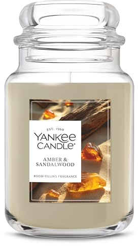 Yankee Candle Amber & Sandalwood, Scented Candle, 22oz Large Jar with up to 150 Hour Burn Time, Giftable