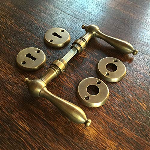 Antikas - Maniglia per porta interna, in ottone anticato, con rosette