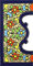 Schilder mit Zahlen und Nummern auf vielfarbiger Keramikkachel. Handgemalte Kordeltechnik fuer Schilder mit Namen, Adressen und Wegweisern. Persoenlich gestaltbarer Text. Design FLORES MEDIANO 10,9cm x 5,4 cm (RAND „CENEFA).