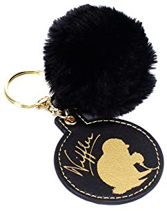 Fantastic Beasts Schlüssel- anhänger Niffler bedruckt, goldfarben/schwarz, Polyurethean, auf Headerkarte.