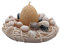 Osternestkerze, Kerze in Osternest aus Wachs, Eikerze gelb-gold, Nest in hellbraun, Geschenkverpackung mit brauner Schleife, 13 x 7 cm