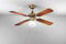 Ventilatore da soffitto con luce in metallo colore ottone brunito 4 pale Ø 105 x H. 42 Kit luce vetro satinato Ø 15cm 1xE27 Max 60W Potenza motore 22W-45W Comandato a catenelle Telecomando ordinabile Lampadario con pale Reversibile PERENZ 7064OB