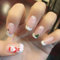 24Pcs Christmas False Nails Short Square, Nude French Press on Nails Cute Snowman Santa Claus Fake Nails, Full Cover Acrylic Stick on Nails with Snowflakes, Elegant Reusable Glue on Nails for Women