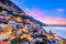adrium Acryl-Bild 110 x 70 cm: Positano, Italien entlang der Amalfiküste in der Abenddämmerung. (205374446)