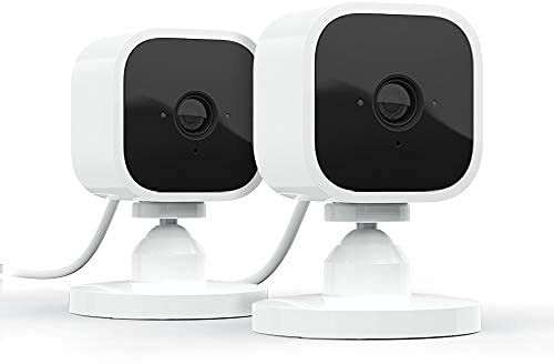 Blink Mini - Compact indoor plug-in smart security camera, 1080p HD video, night vision, motion detection, two-way audio, easy set up, Works with Alexa – 2 cameras (White)