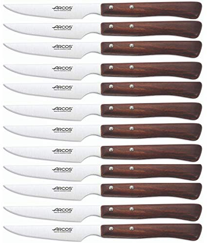 Arcos Serie Cuchillos de Mesa Caja 12 uds Cuchillo Chuletero, Hoja Filo de Acero Inoxidable NITRUM de 110 mm, Mango Madera comprimida Color marrón (12 UDS)